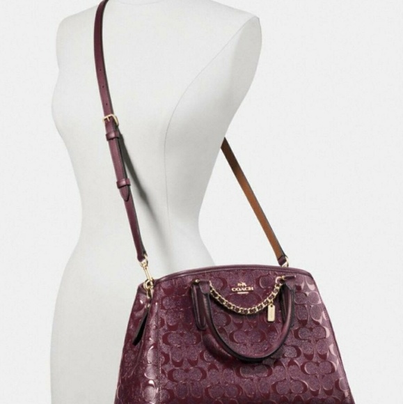 coach embossed bag